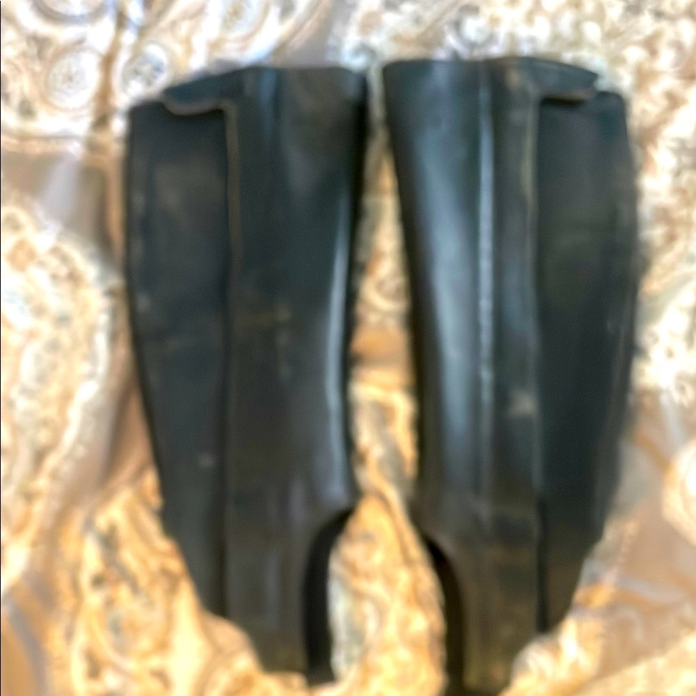 Ariat leather equestrian style calve guards .